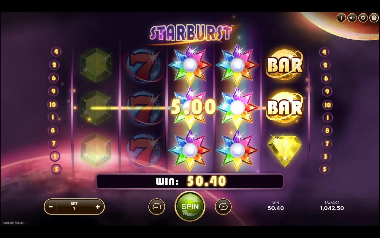 The run's 50.40 win with two full Starburst Wild reels (the expanded rainbow Wilds on reels 4 and 5) lined up across the gems